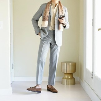 Tan Long Sleeve Shirt Outfits For Men: You'll be amazed at how extremely easy it is to put together this refined outfit. Just a tan long sleeve shirt and a grey suit. Our favorite of a multitude of ways to complement this ensemble is with dark brown suede tassel loafers.