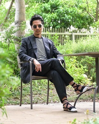 Men's Charcoal Suit, White and Navy Horizontal Striped Long Sleeve T-Shirt, White and Black Canvas Espadrilles, Black Sunglasses