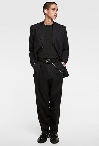 Black Chunky Leather Loafers Outfits For Men: This combination of a black vertical striped suit and a black long sleeve t-shirt is a real life saver when you need to look effortlessly smart but have no time to dress up. Finishing off with a pair of black chunky leather loafers is a guaranteed way to bring an extra dose of style to this look.