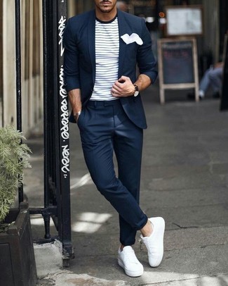 Navy Suit with White Leather Low Top Sneakers Outfits In Their 30s: Wear a navy suit to have all eyes on you. White leather low top sneakers are the simplest way to inject a sense of stylish casualness into your ensemble. As a young gentleman, you want to start dressing maturely. In this case, looks like this are a goofproof option.