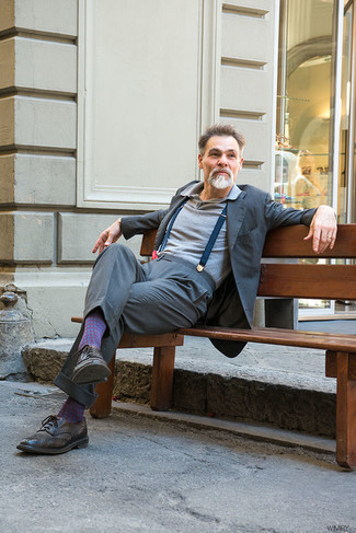 Simone Righi wearing Grey Suit, Grey Polo, Dark Brown Leather Brogues, Navy Suspenders