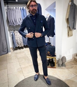 Navy Leather Double Monks Outfits: You'll be surprised at how extremely easy it is for any gentleman to throw together this classic and casual getup. Just a navy suit teamed with a navy polo. Bring a different twist to this outfit by wearing navy leather double monks.