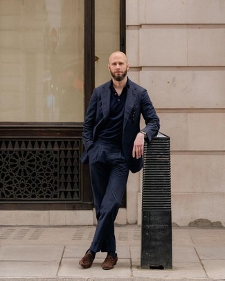 Dark Brown Suede Loafers Outfits For Men: Teaming a navy seersucker suit and a navy polo is a guaranteed way to infuse your styling arsenal with some relaxed elegance. If you want to instantly perk up your outfit with one item, complete your look with a pair of dark brown suede loafers.