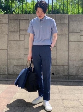 Light Blue Polo Outfits For Men: Teaming a light blue polo and a navy suit is a guaranteed way to inject your wardrobe with some manly elegance. Kick up this whole outfit by rounding off with a pair of white canvas low top sneakers.