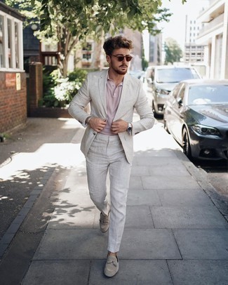 Grey Suit Hot Weather Outfits: Perfect the semi-casual look in a grey suit and a pink polo. Throw a pair of grey suede tassel loafers in the mix for a masculine aesthetic.