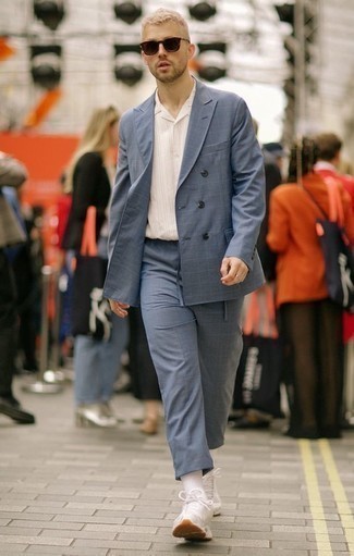 Blue Check Suit Outfits: You'll be surprised at how easy it is for any gentleman to throw together this effortlessly classic outfit. Just a blue check suit and a white vertical striped short sleeve shirt. Give a more relaxed twist to an otherwise standard getup by slipping into white athletic shoes.