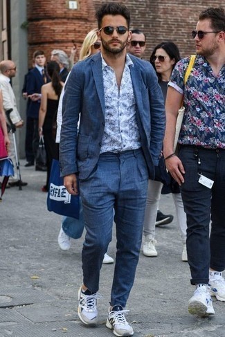Navy Linen Suit Outfits: A smart combo of a navy linen suit and a white and navy print short sleeve shirt is fitting in many different situations. For a modern on and off-duty mix, add white and navy athletic shoes to the mix.