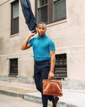 Navy Suit Outfits: Pairing a navy suit and a blue polka dot short sleeve shirt is a fail-safe way to breathe refinement into your closet. Bring a different twist to your ensemble with a pair of dark brown suede double monks.