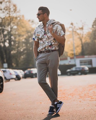 Men's Grey Suit, White Floral Short Sleeve Shirt, Navy and White Low Top Sneakers, Dark Brown Leather Belt