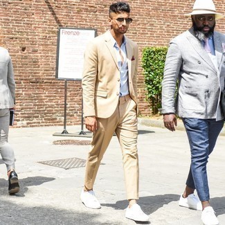 Burgundy Pocket Square Outfits: This laid-back combination of a tan suit and a burgundy pocket square is a safe bet when you need to look great but have no time. A pair of white canvas low top sneakers looks perfect finishing off this outfit.