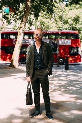 Olive Suit Outfits: Teaming an olive suit and a navy plaid short sleeve shirt is a fail-safe way to infuse elegance into your current styling routine. A pair of navy canvas low top sneakers will instantly play down a classic ensemble.