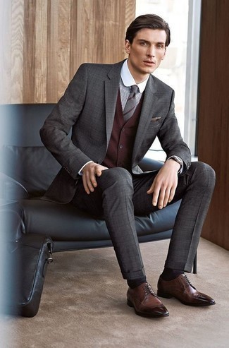 Grey Horizontal Striped Tie Outfits For Men: One of the best ways to style such an essential piece as a charcoal check suit is to team it with a grey horizontal striped tie. Inject a more laid-back aesthetic into your outfit by wearing brown leather brogues.