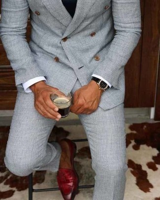 Black Sweater Vest Outfits For Men: This combo of a black sweater vest and a grey check suit is a real lifesaver when you need to look like a stylish gent. When not sure about the footwear, introduce burgundy leather loafers to the mix.