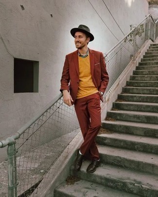 Yellow Sweater Vest Outfits For Men: This pairing of a yellow sweater vest and a tobacco suit speaks rugged sophistication. Dark brown leather derby shoes will bring a mellow feel to this ensemble.
