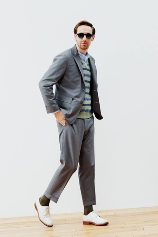 Grey Suit with Long Sleeve Shirt Outfits: This ensemble proves it is totally worth investing in such timeless menswear items as a grey suit and a long sleeve shirt. Consider a pair of white canvas derby shoes as the glue that will bring your look together.
