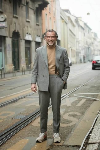 Dark Brown Suspenders Outfits: Consider wearing a grey suit and dark brown suspenders for relaxed dressing with a clear fashion twist. For a more relaxed aesthetic, why not complete this outfit with a pair of beige athletic shoes?