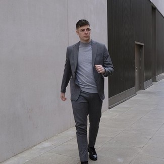 Charcoal Suit Outfits: This pairing of a charcoal suit and a grey turtleneck is incredibly smart and provides instant polish. Add black leather brogues to the mix and the whole ensemble will come together quite nicely.