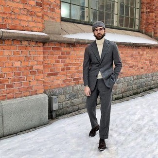Grey Wool Suit Chill Weather Outfits: A grey wool suit looks so classy when matched with a white turtleneck for an outfit worthy of a contemporary gent. Dark brown leather casual boots will give an easy-going feel to an otherwise all-too-safe look.