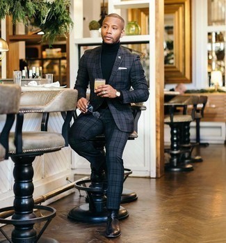 Charcoal Suit with Black Leather Chelsea Boots Outfits: For an effortlessly sleek outfit, dress in a charcoal suit and a navy turtleneck — these items play really well together. Complete this look with a pair of black leather chelsea boots and you're all set looking smashing.