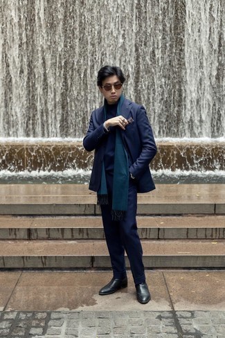 Teal Scarf Outfits For Men: This pairing of a navy suit and a teal scarf combines comfort and functionality and helps keep it low-key yet current. You could perhaps get a bit experimental with shoes and complete your outfit with a pair of black leather chelsea boots.