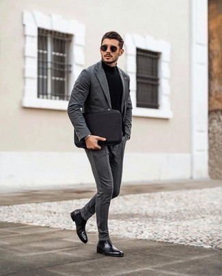 Charcoal Suit with Black Leather Chelsea Boots Outfits: A charcoal suit and a black turtleneck are absolute staples if you're putting together a smart wardrobe that matches up to the highest men's fashion standards. Black leather chelsea boots will be the perfect accompaniment for your look.