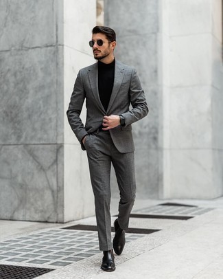 Black Turtleneck Dressy Outfits For Men: A black turtleneck looks so elegant when matched with a grey suit for an ensemble worthy of a true gentleman. Look at how great this ensemble goes with black leather chelsea boots.