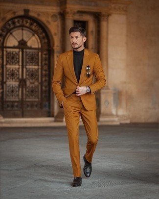 Tobacco Suit Outfits: A tobacco suit and a black turtleneck are absolute staples if you're crafting an elegant wardrobe that holds to the highest men's fashion standards. The whole ensemble comes together wonderfully if you introduce black leather chelsea boots to the equation.