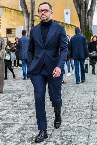 Navy Turtleneck Dressy Outfits For Men: Undeniable proof that a navy turtleneck and a navy suit look amazing when married together in an elegant look for a modern man. Introduce a pair of black leather derby shoes to the mix for maximum style points.