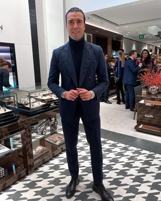 Navy Wool Turtleneck Outfits For Men: This combination of a navy wool turtleneck and a navy suit is a foolproof option when you need to look elegant and seriously dapper. Let your styling expertise really shine by completing your ensemble with black leather derby shoes.