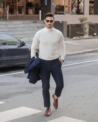 Dark Brown Leather Derby Shoes Spring Outfits: Reach for a navy suit and a white turtleneck if you're going for a clean-cut, sharp ensemble. This outfit is completed really well with dark brown leather derby shoes. Spring calls for standout getups just like this one.