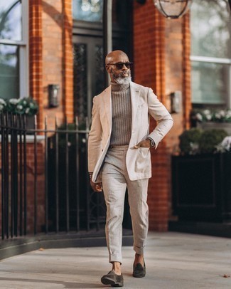 Grey Wool Turtleneck Outfits For Men: This polished pairing of a grey wool turtleneck and a beige suit is a common choice among the dapper guys. A pair of dark green velvet loafers will be a welcome accompaniment for this outfit.