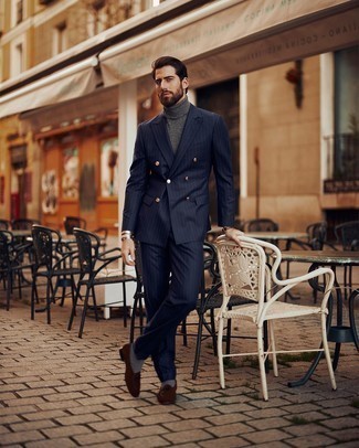 Grey Wool Turtleneck Outfits For Men: If you take your style seriously, go for classic style in a grey wool turtleneck and a navy vertical striped suit. Feeling venturesome today? Spice up your look by finishing with a pair of dark brown suede loafers.
