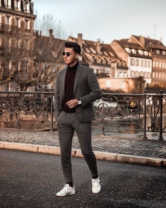 Burgundy Turtleneck Outfits For Men: To look like a real dandy with a great deal of style, opt for a burgundy turtleneck and a charcoal suit. A pair of white canvas low top sneakers will introduce a more laid-back aesthetic to the ensemble.