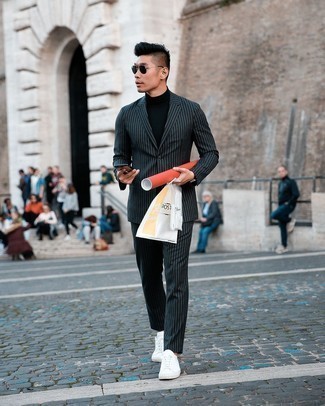 Black and White Vertical Striped Suit Outfits: This combination of a black and white vertical striped suit and a black turtleneck is a goofproof option when you need to look effortlessly neat in a flash. Throw a pair of white canvas low top sneakers into the mix to keep the look fresh.