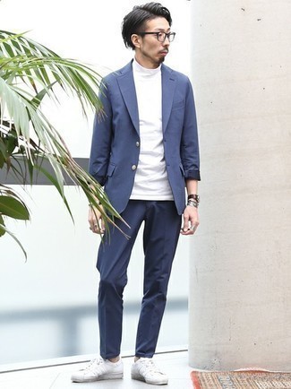 White Turtleneck with Low Top Sneakers Outfits For Men: A white turtleneck and a navy suit are indispensable players in any modern gentleman's sartorial collection. Rounding off with low top sneakers is a fail-safe way to inject a sense of stylish nonchalance into your outfit.