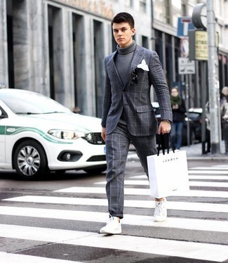 Charcoal Check Suit Outfits: The best foundation for a knockout and casually sleek outfit? A charcoal check suit with a grey wool turtleneck. Want to tone it down with footwear? Add a pair of white canvas low top sneakers to the mix for the day.