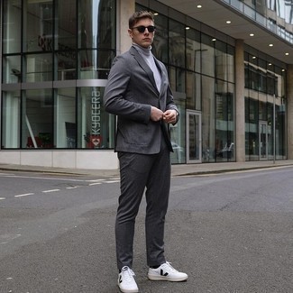 Men's Charcoal Suit, Grey Turtleneck, White and Black Leather Low Top Sneakers, Dark Brown Sunglasses
