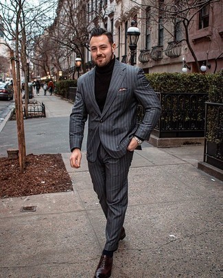 Charcoal Vertical Striped Suit Outfits: You'll be amazed at how extremely easy it is for any man to get dressed like this. Just a charcoal vertical striped suit paired with a dark brown turtleneck. To bring out a refined side of you, complete your getup with a pair of burgundy leather oxford shoes.
