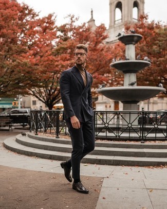 Tan Turtleneck Outfits For Men: You're looking at the definitive proof that a tan turtleneck and a charcoal suit look awesome together in an elegant outfit for a modern dandy. Introduce dark brown leather oxford shoes to the mix for extra fashion points.