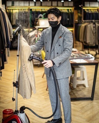 Grey Wool Suit Warm Weather Outfits: Putting together a grey wool suit and a black turtleneck is a fail-safe way to inject class into your current styling routine. Complete this getup with a pair of black leather tassel loafers and you're all set looking dashing.