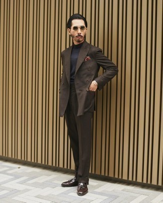 Dark Brown Suit Outfits: You'll be surprised at how easy it is to get dressed this way. Just a dark brown suit and a navy turtleneck. Let your sartorial credentials really shine by finishing your ensemble with dark brown leather tassel loafers.