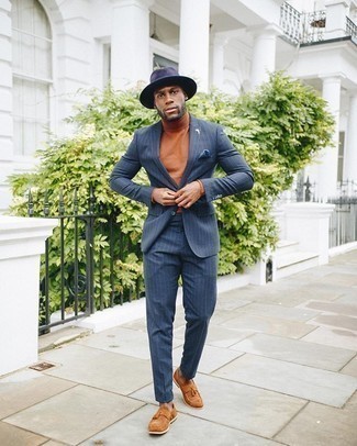 Navy Wool Hat Outfits For Men: If you like casual style, why not take this pairing of a navy vertical striped suit and a navy wool hat for a spin? If you wish to immediately up the style ante of this outfit with one single item, introduce tobacco suede tassel loafers to the mix.