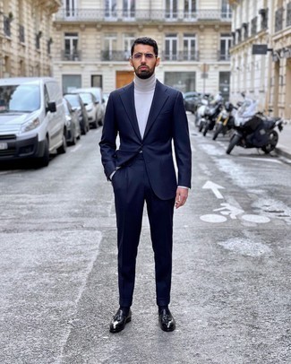 Light Violet Sunglasses Outfits For Men: For an off-duty outfit, consider wearing a navy suit and light violet sunglasses — these items work nicely together. You can get a bit experimental on the shoe front and complete your getup with a pair of black leather tassel loafers.