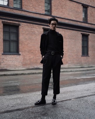 Black Suit Outfits: Swing into something polished yet contemporary with a black suit and a black turtleneck. Introduce a pair of black leather tassel loafers to the equation and you're all done and looking incredible.