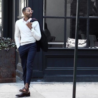 Navy Suit Outfits: Team a navy suit with a white v-neck sweater if you're going for a proper, classic look. Dark brown leather monks integrate smoothly within a ton of ensembles.