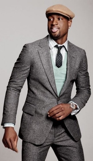 Try pairing a grey wool suit with a mint v-neck sweater if you're going for a neat, fashionable outfit.