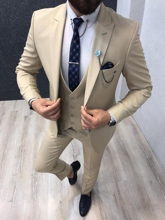 Tan Waistcoat Outfits: Try pairing a tan waistcoat with a beige suit to look handsome and dapper. In the footwear department, go for something on the casual end of the spectrum with a pair of navy leather tassel loafers.