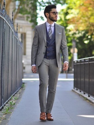 Grey Horizontal Striped Tie Outfits For Men: This pairing of a grey suit and a grey horizontal striped tie is a surefire option when you need to look classy and seriously smart. Infuse a mellow touch into your outfit by sporting brown leather double monks.