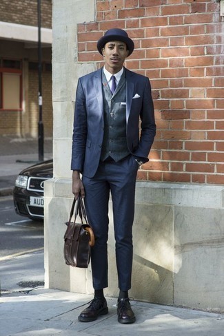 Dark Brown Leather Briefcase Outfits: For sharp menswear style without the need to sacrifice on functionality, we like this pairing of a navy suit and a dark brown leather briefcase. Why not complete this look with a pair of dark purple leather brogues for an added touch of style?
