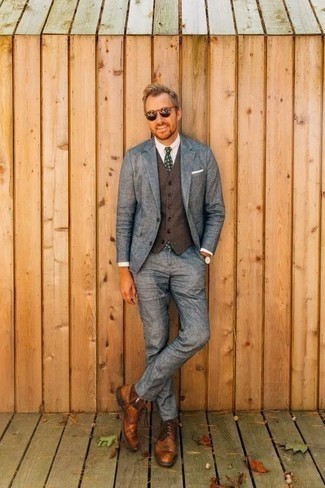 Tobacco Leather Brogue Boots Outfits: You're looking at the hard proof that a light blue suit and a brown waistcoat are awesome when teamed together in an elegant ensemble for today's guy. To infuse a more laid-back aesthetic into this look, introduce tobacco leather brogue boots to your ensemble.